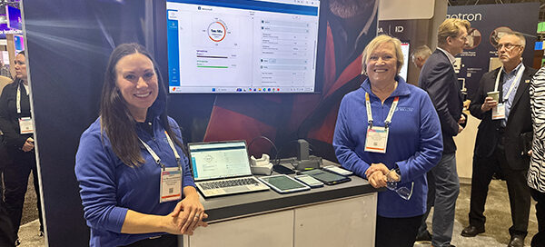 Kristy Blomquist (left) at HIMSS