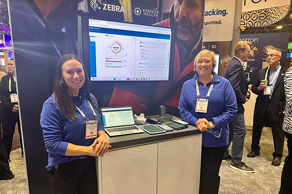 Kristy Blomquist (left) at HIMSS